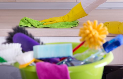 Workers and cleaning equipment symbolizing ethical labor standards