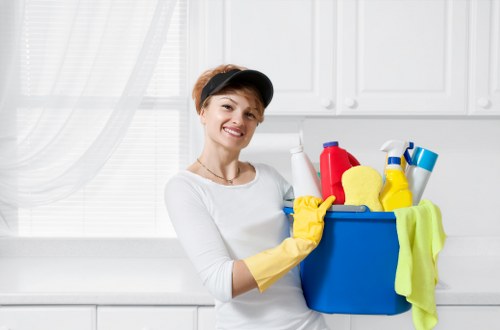 Professional carpet cleaner treating a stained carpet