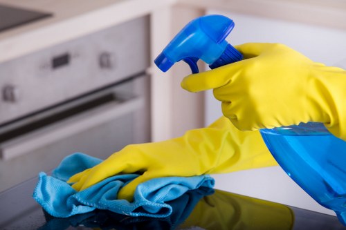 Technician using safety practices during carpet cleaning