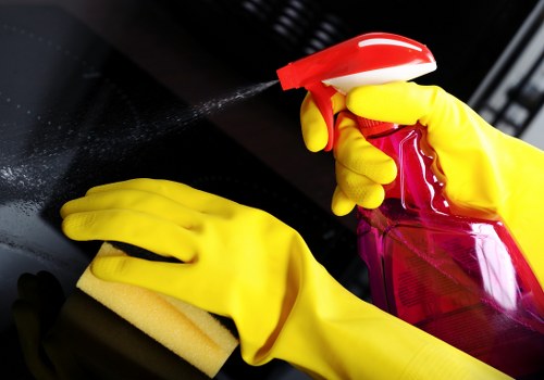 Cleaning staff wearing PPE while working indoors